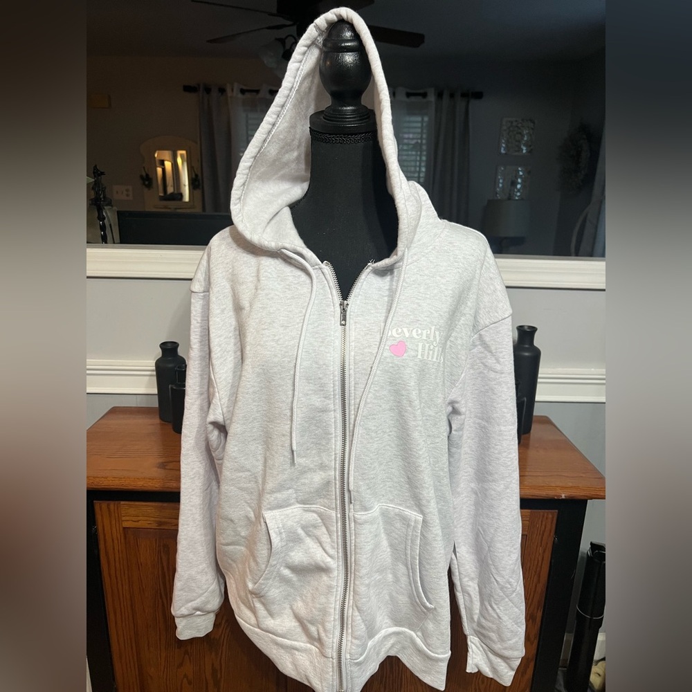 Better/Together -White Zip-Up Hoodie “All you Need Is Love’ on the Back.